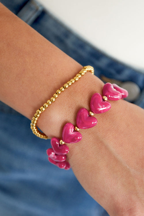 Bracciale elastico con perline a forma di cuore